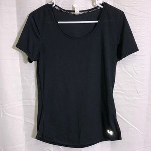 Under Armour Black heat gear running tshirt. Size M